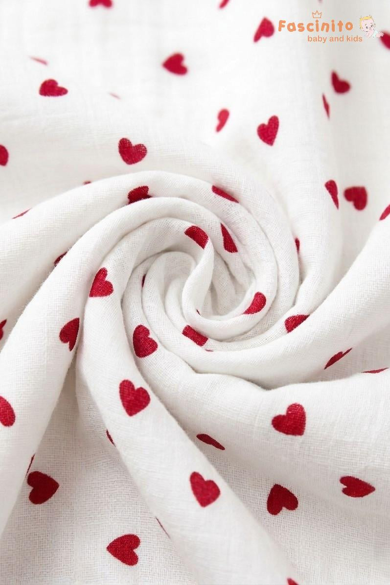 White fabric with red heart patterns, rolled up, on a white background with 'Fascinito' branding.