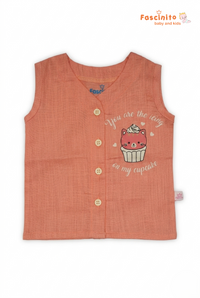 Front view of Baby Jhabla Top in peach cupcake print with front button closure