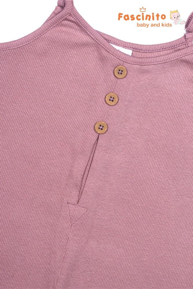 Close-up of dusty rose ribbed baby playsuit with front button detail and sleeveless cotton design