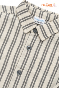 Close up of boys striped cotton shirt with collar and button detail
