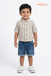 Boy wearing striped cotton shirt with denim shorts on white background