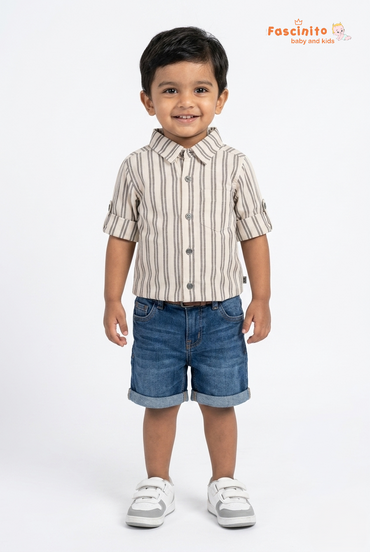 Boy wearing striped cotton shirt with denim shorts on white background