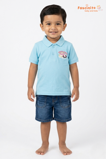 Toddler boy wearing Fascinito light blue polo t shirt with car print