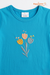 Fascinito girls blue floral embroidered cotton knot top close up