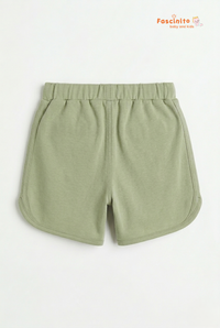 Back view of Fascinito girls sage green cotton shorts with elastic waistband